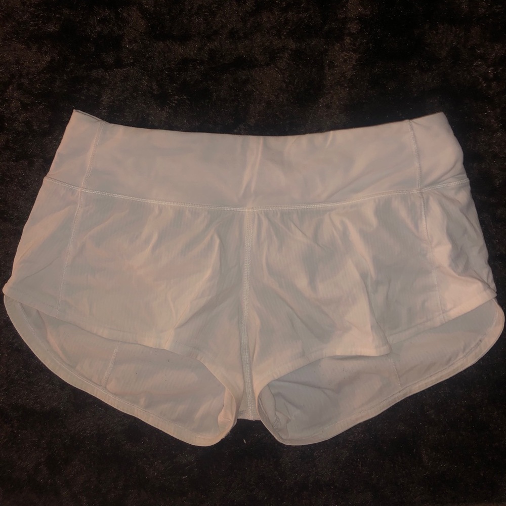 White Lululemon Speed up Shorts. Size 4